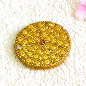 Gold sequins mirror